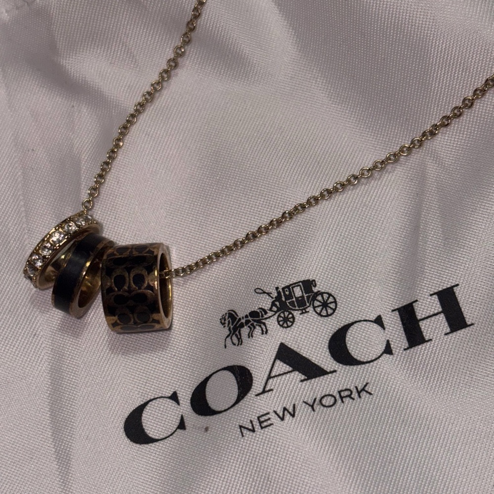 Coach Gold and Black 3 Ring Pendant Necklace